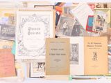 a pile of old books sitting on a table