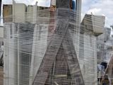 a ladder that is sitting next to a pile of boxes