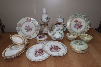a table with a lot of china on it