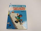 la couverture d'une bande dessinée sur laquelle figure un homme sur un snowboard