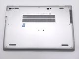 the back of a silver laptop with a blue sticker on it