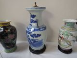 three vases that are sitting on a table