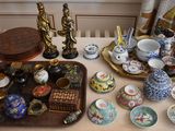 a table with a tray and a tray with a lot of items on it