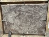 a large piece of wood that is sitting on the ground