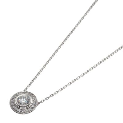 a close up of a necklace with a diamond on a chain