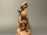 statue of a woman holding a child on her lap
