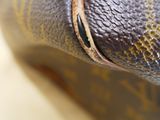 a close up view of a louis vuitton bag