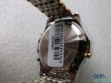 a watch that has a bar code on the back of it