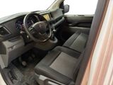 a view of the inside of a vehicle from the driver ' s seat