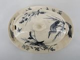 an image of a plate with a bird design on it
