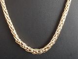 a gold chain necklace on a mannequin mannequin mannequin mannequin mannequin mannequin mannequin mannequin manne
