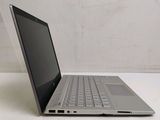 a laptop computer sitting on a table with a white background