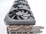 a close up of a video card with a fan on it