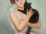 un tableau représentant une femme tenant un chat dans ses bras