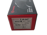 a red box that has a black and white label on it