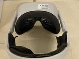 a pair of goggles sitting on top of a table