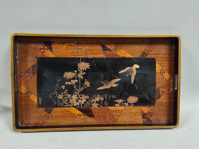 an image of a picture of birds in flight on a wooden tray