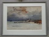 aquarelle encadrée représentant une scène de plage avec un bateau sur l'eau