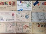 many different types of letters and envelopes laid out on a table