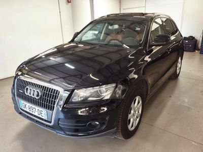 an image of a black audi suv parked in a garage