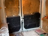 a white van with two doors that are open