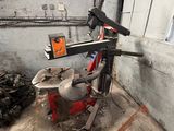 a machine that is sitting in a room with tools