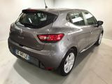 a picture of a grey car in a showroom