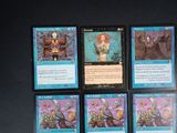 several cards of different types are on a black surface