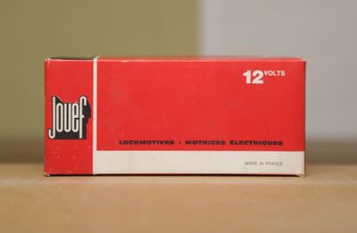 a box of cigarettes sitting on a table in a room