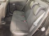 the back seats of a car are empty with no one in it