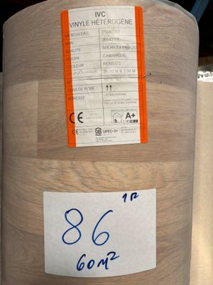 a picture of a roll of wood flooring with a price tag