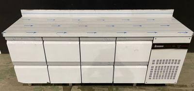 an image of a stack of white refrigerators sitting on top of a floor