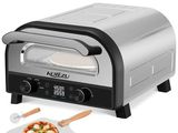 a small oven with a pizza on it and a pizza cutter next to it