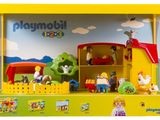 un coffret Playmobil contenant une scène de ferme