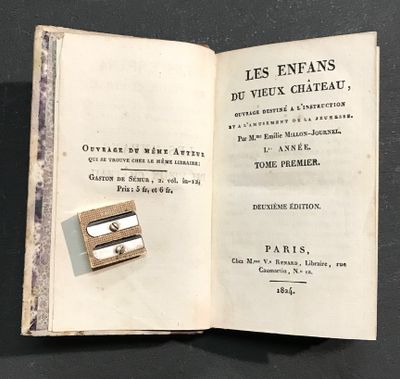 a book open with a picture of a stamp on it
