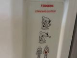 a white refrigerator with a sticker on the door