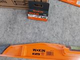 a box of woodworking tools on the floor