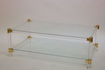 an image of a clear glass coffee table on a white background