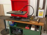 an image of a workbench with tools on top of it
