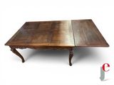 an image of a table with two leaves on top of it