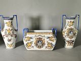 three vases that are sitting next to each other on a table