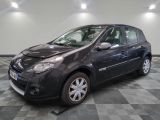 a picture of a black car that is on a checkered floor