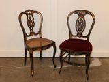 two chairs sitting next to each other in a room