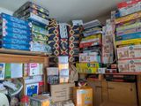 a room filled with many boxes and boxes on the floor