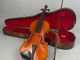 an image of a violin and a violin case on a white background