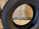 a close up of a tire sitting on top of a cardboard box