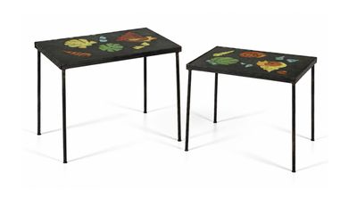two small tables with flowers painted on them sitting side by side