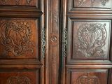 a large wooden door with intricate carvings on it