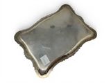 an antique silver tray on a white background with a tag on it