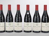 six bouteilles de vin rouge alignées